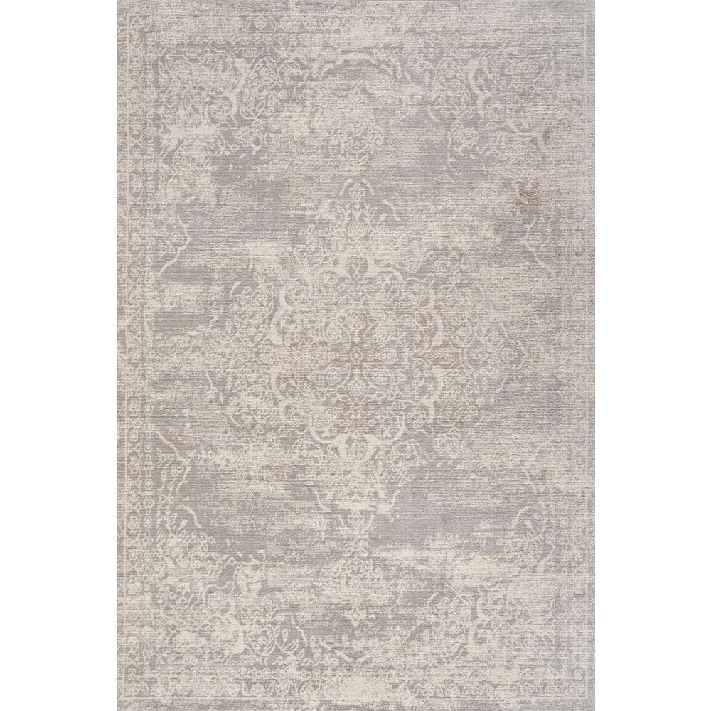Ivory Synthetic 8' x 10' Reversible Rectangular Area Rug