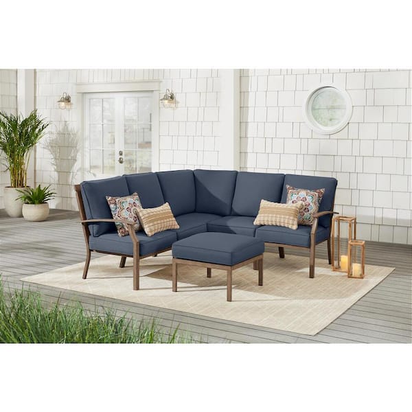Hampton Bay Geneva 6-Piece Brown Wicker Outdoor Patio Sectional Sofa Seating Set with Ottoman and CushionGuard Sky Blue Cushions