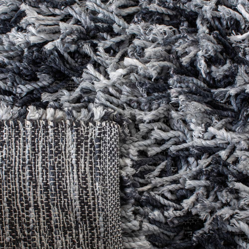 Handmade Black and Ivory Synthetic Shag Rug, 6' x 9'