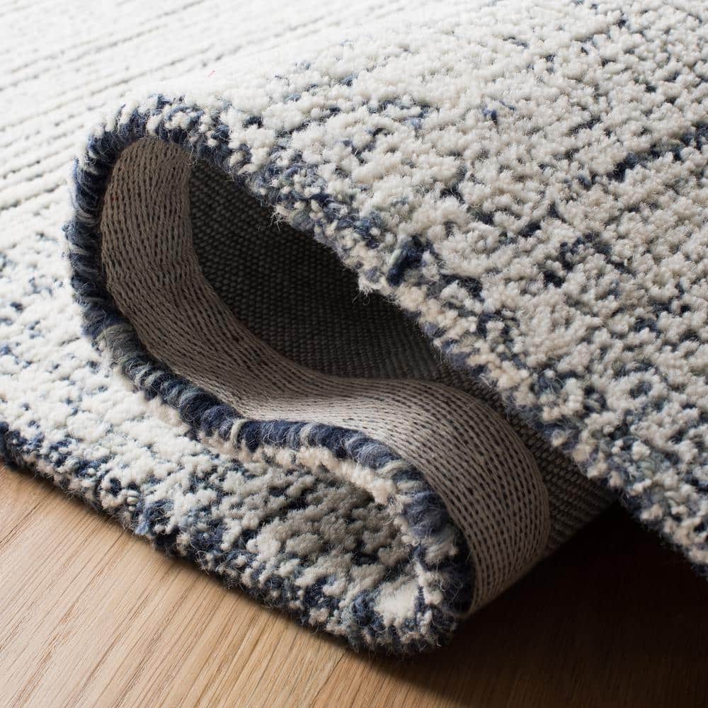 Ivory and Navy Hand-Tufted Wool Area Rug, 8' x 10'