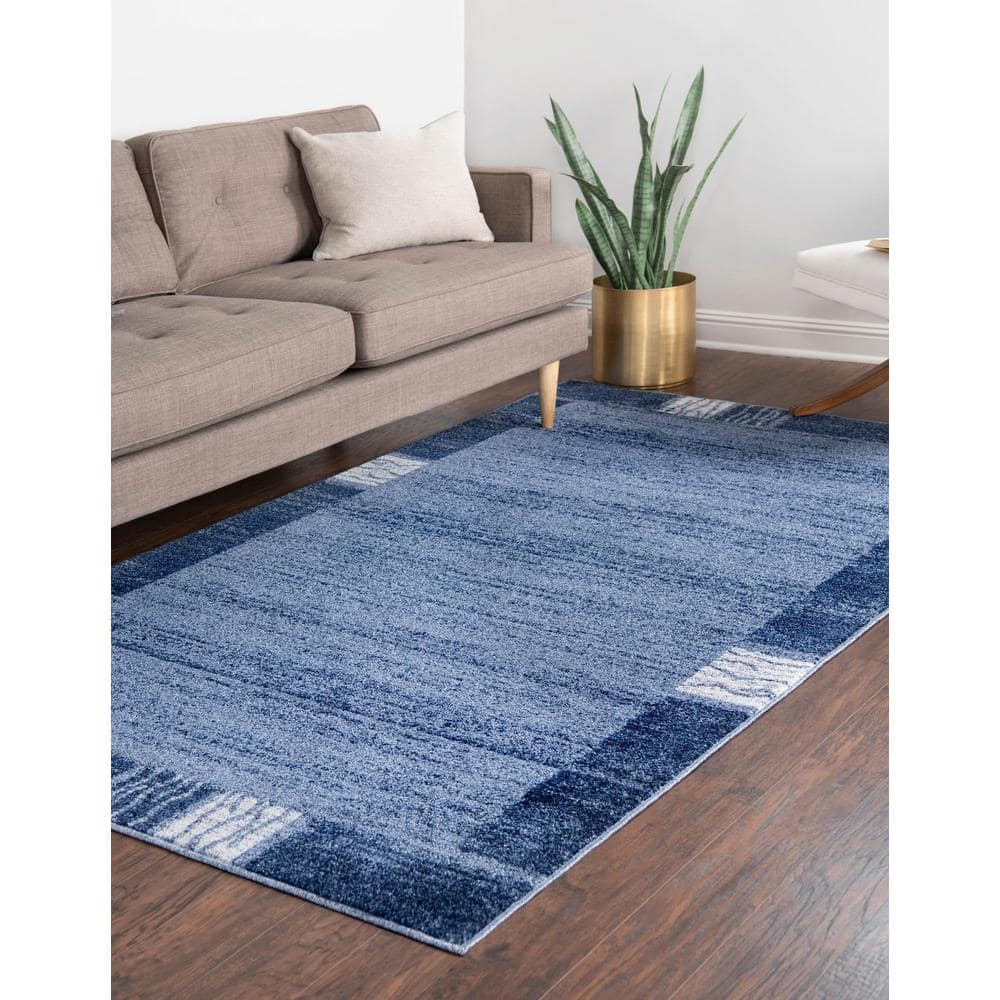 Serene Light Blue Geometric 6' x 9' Tufted Synthetic Rug