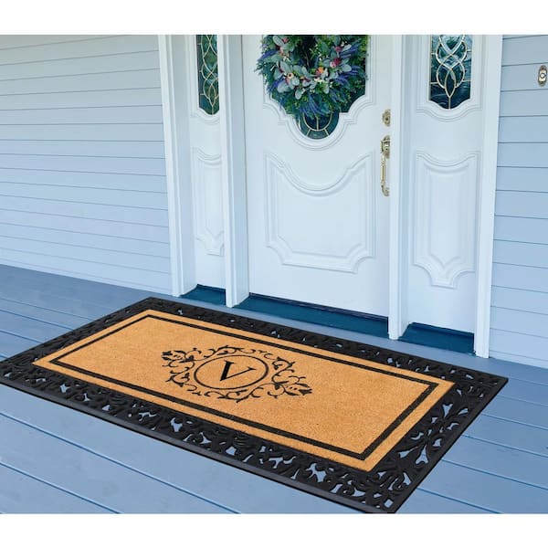 https://images.thdstatic.com/productImages/9ee31a95-647f-463c-b9d9-159c3f0f0944/svn/black-beige-a1-home-collections-door-mats-a1hc200113-v-c3_600.jpg