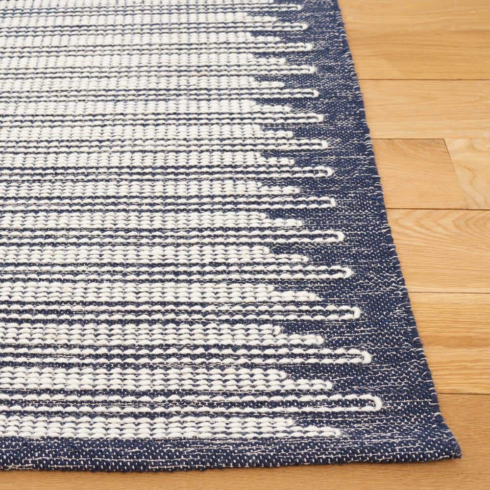 Ivory and Navy Tufted Wool Rectangular Area Rug, 5' x 8'