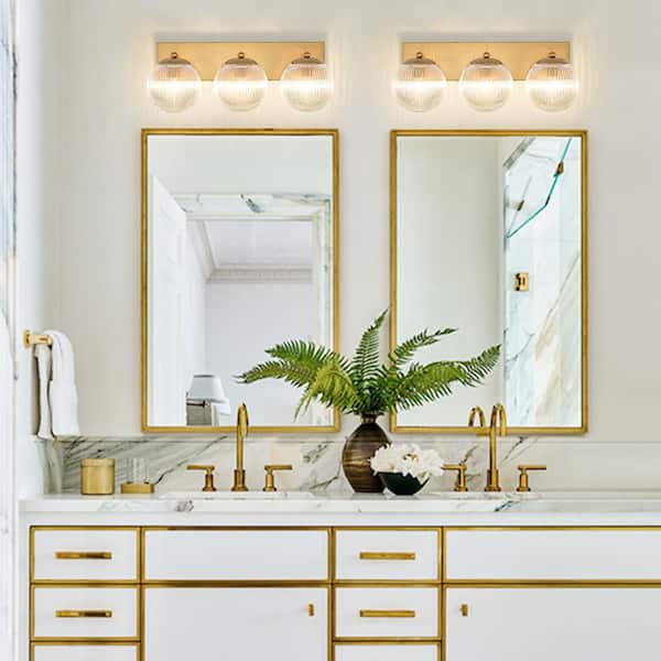 Noble 22.1 in. 3-Light Vintage Industrial Brass Bathroom Vanity Light with Clear Globe Ribbed Glass Shade