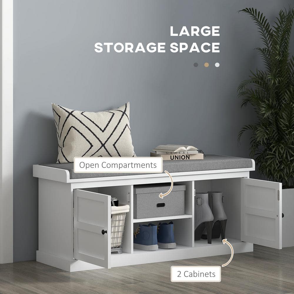 White Wood Storage Bench with Gray Cushion and Cabinets
