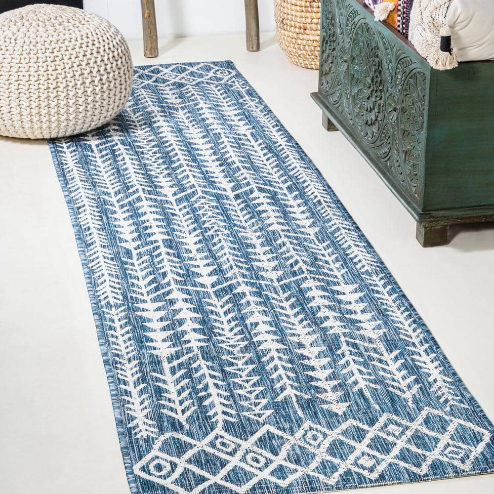 https://images.thdstatic.com/productImages/9f026111-5a3d-47b2-8b8a-38cea82176c3/svn/blue-ivory-jonathan-y-area-rugs-smb132c-28-64_1000.jpg