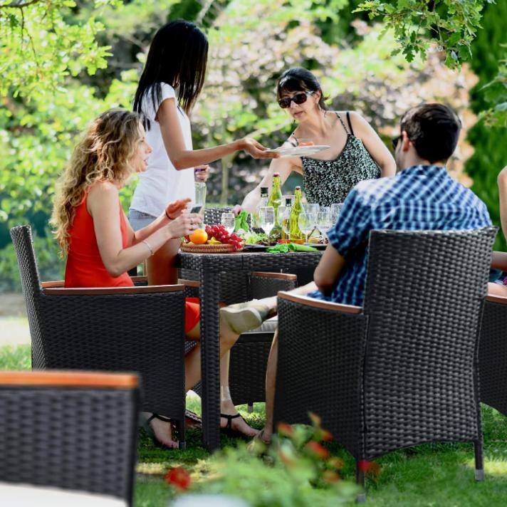 7-Piece Reddish-Brown Wood and Black Wicker Outdoor Dining Set with Beige Cushions