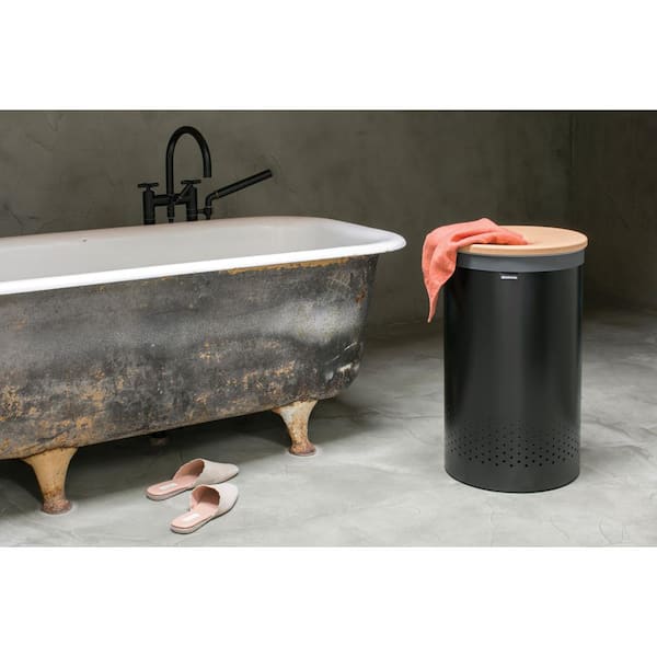 https://images.thdstatic.com/productImages/9f478c48-f5e3-4dc1-8b43-991cf3a2704f/svn/matte-black-brabantia-laundry-hampers-120022-31_600.jpg