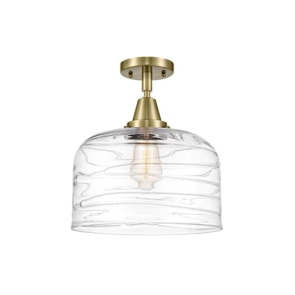 Bell 12 in. 1-Light Antique Brass Industrial Flush Mount with Clear Glass Shade
