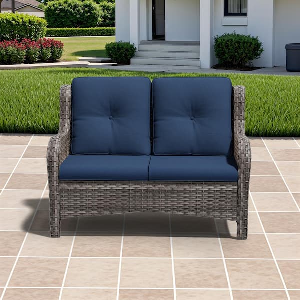 Brown Wicker Outdoor Patio Loveseat with Blue Cushions