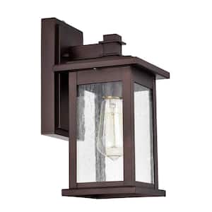 6 in. W 1-Light Oil Rubbed Bronze Sconce with Seeded Glass Shade and Dusk to Dawn Sensor