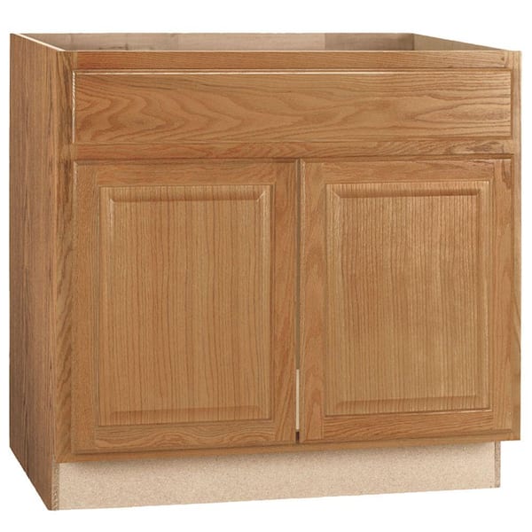 Hampton Bay Hampton Medium Oak Raised Panel Stock Assembled Sink Base Kitchen Cabinet (36 in. x 34.5 in. x 24 in.)