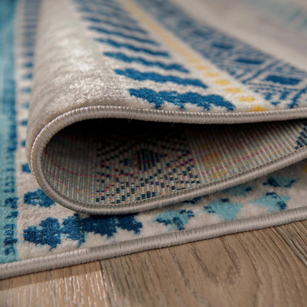 Boho Blue Geometric Tufted Synthetic Area Rug