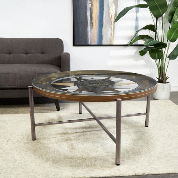 Litton Lane 43 in. Silver Medium Round Glass Compass Inspired Coffee Table with Gear Details