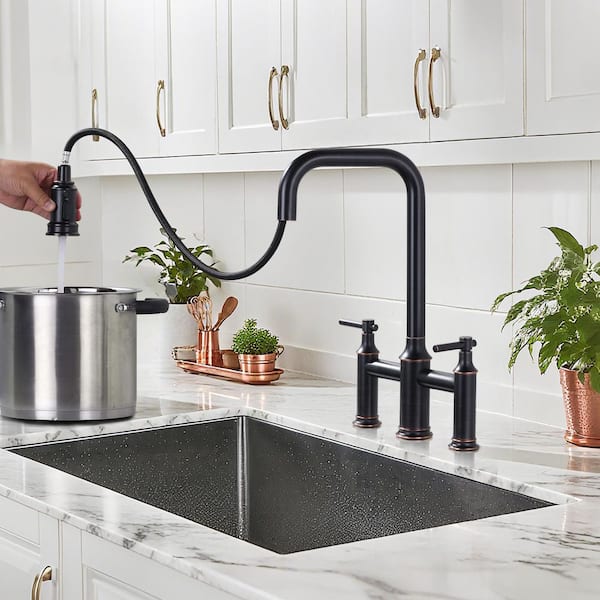 Double Handle Bridge Kitchen Faucet with Pull Down Sprayer in Oil Rubbed Bronze