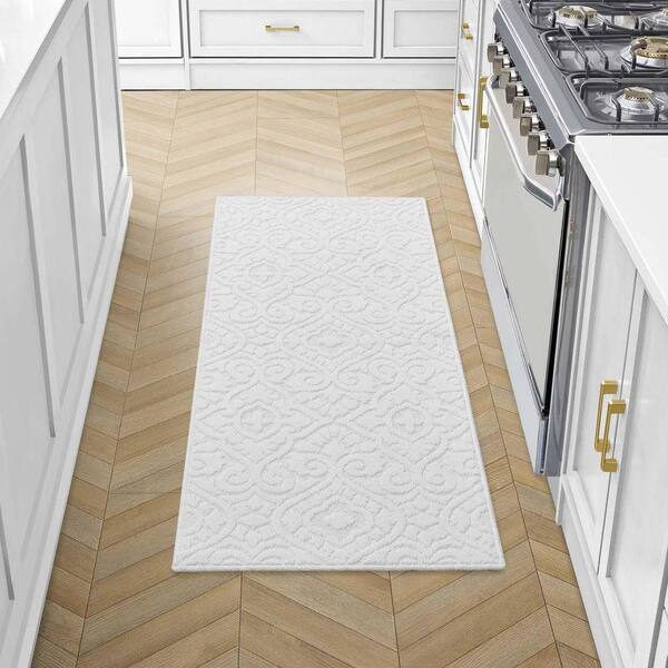 Feya Solid Ivory 2 ft. x 5 ft. Tufted Medallion Polypropylene Runner Rug