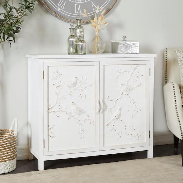 Litton Lane White Wood Embossed 1 Shelf and 2 Doors Floral Cabinet