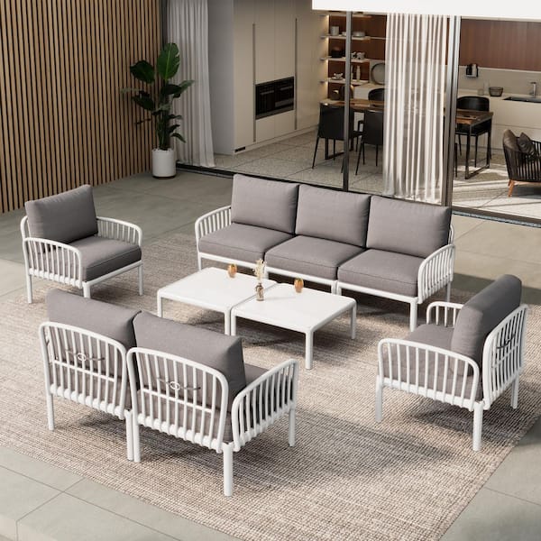 Modulo 7-Piece Patio Plastic Frame Outdoor Conversation Set with Light Gray Cushions, Glass Table Top, White