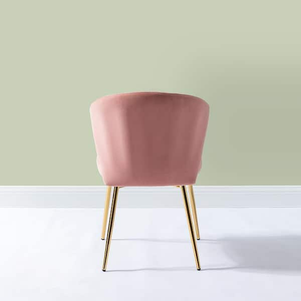 pink chair with white legs