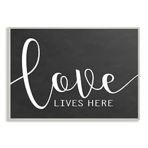 12.5 in. x 18.5 in. "Love Lives Here" by Lettered and Lined Printed Wood Wall Art