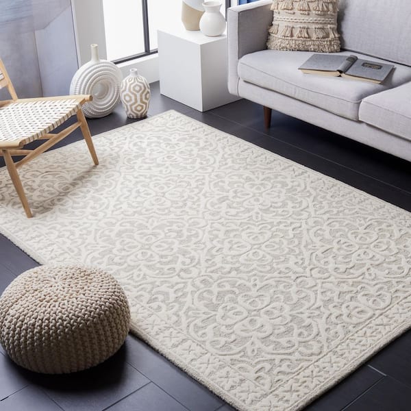 https://images.thdstatic.com/productImages/a020717d-d396-4fff-8a4d-f3896a0d56bc/svn/grey-ivory-safavieh-area-rugs-met857g-6sq-e1_600.jpg