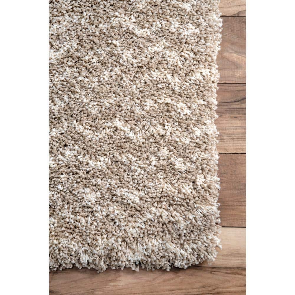 Dimora Cream Handmade Shaggy Chevron 7' x 9' Area Rug