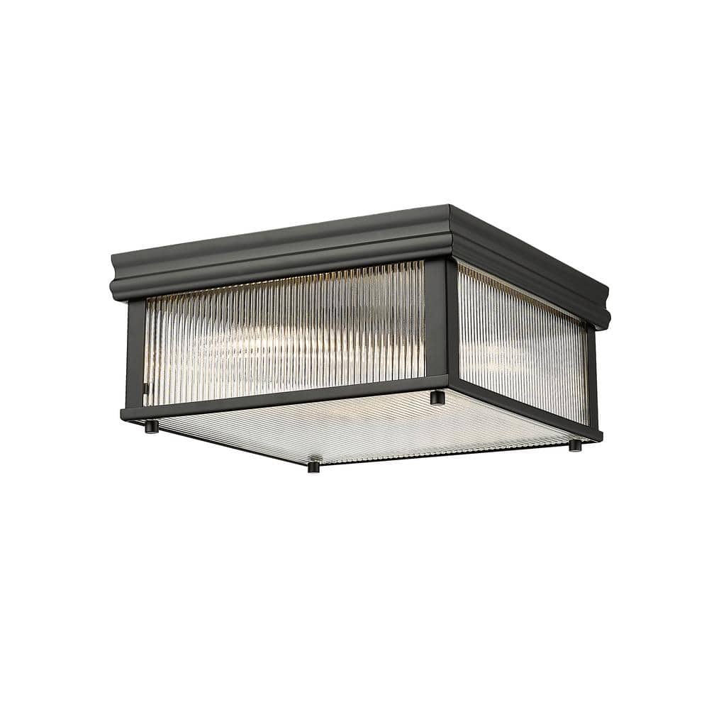 Carnaby 13 in. Matte Black Integrated LED Flush Mount with Clear Ribbed Gla