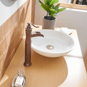 Single Hole Single Handle Waterfall Bathroom Vessel Sink Faucet with Pop-up Drain Assembly in Antique Copper