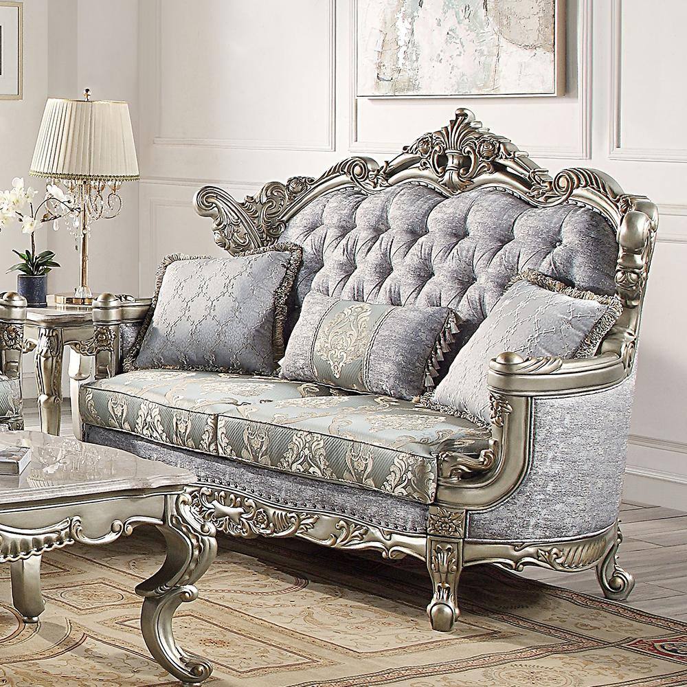 Elegant Floral Tufted Fabric Loveseat with Rolled Arms and Nailhead Accents