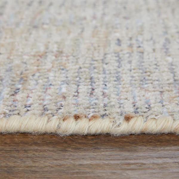 9 ft. x 12 ft. Ivory Tan and Blue Floral Hand Woven Distressed Area Rug with Fringe