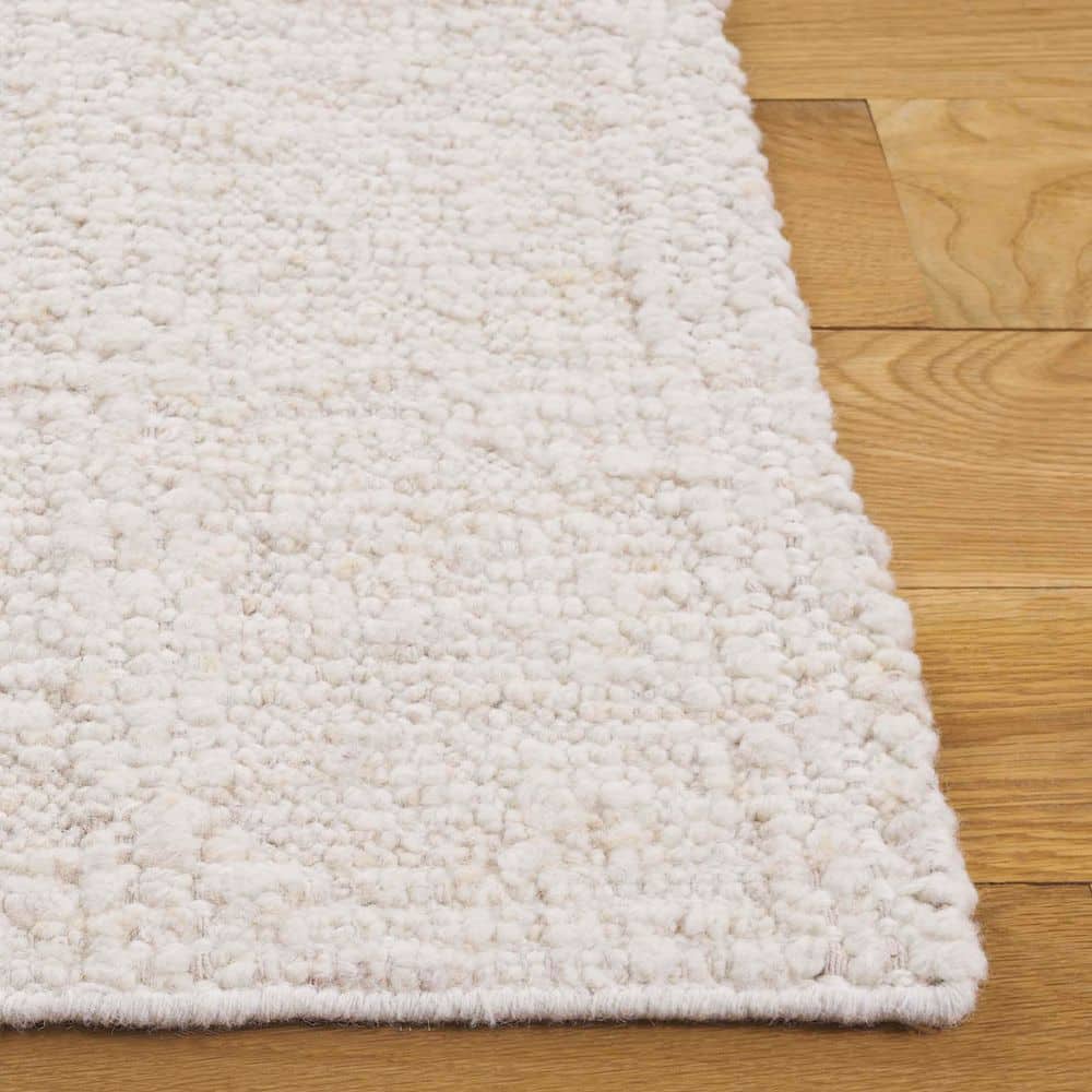 Manhattan 9 ft. x 12 ft. Ivory Modern Solid Color Area Rug - thumbnail 6