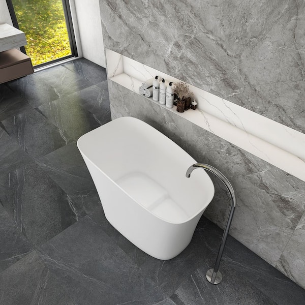 Moray 52 in. x 29 in. Stone Resin Solid Surface Freestanding Single Slipper Soaking Bathtub in White with Brass Drain