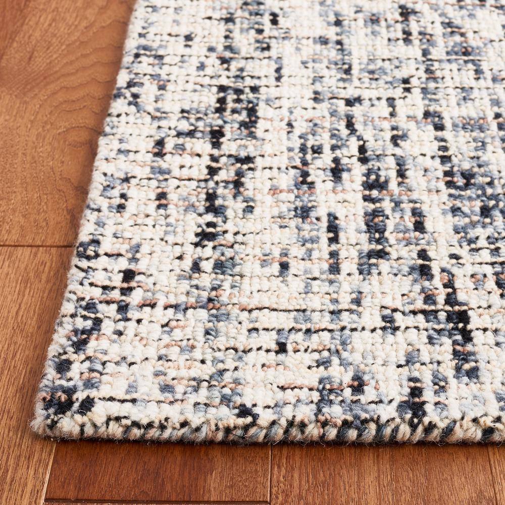 Handmade Black and Beige Abstract Wool Area Rug, 4' x 6'