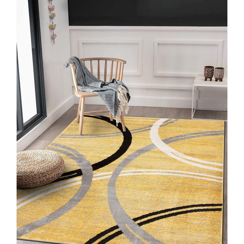 Yellow and Gray Abstract Circles 8' x 10' Synthetic Area Rug