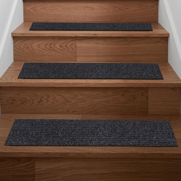 https://images.thdstatic.com/productImages/a09c499e-3561-43e4-8331-0bf75a318d97/svn/black-ottomanson-stair-tread-covers-sst2618-7-1f_600.jpg