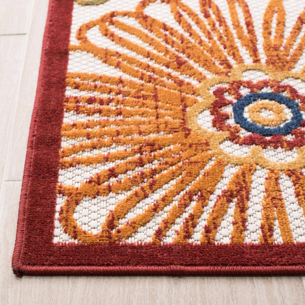 Red and Beige Floral Synthetic 8' x 10' Area Rug