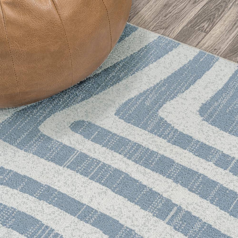 Blue and Cream Abstract Synthetic 4' x 6' Washable Area Rug