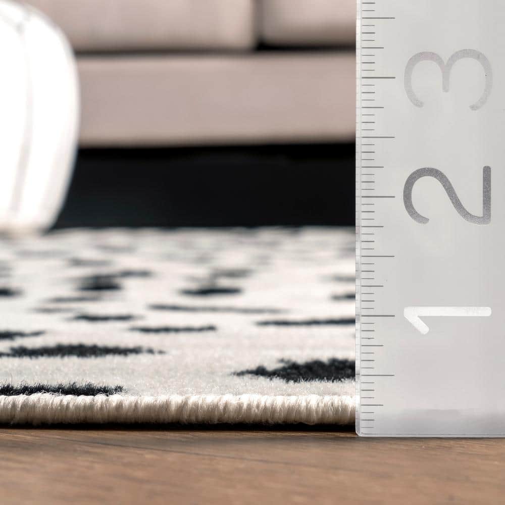 Leopard Print Black and White 8' x 10' Synthetic Area Rug