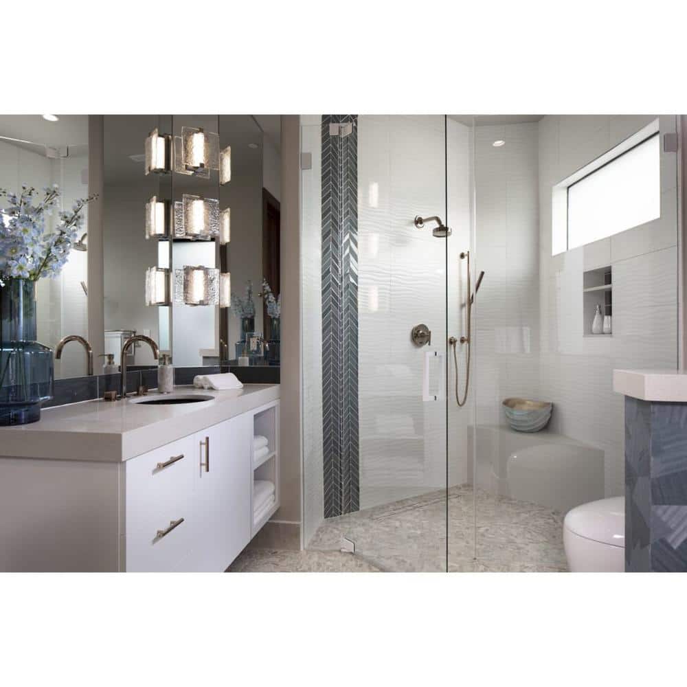Brushed Nickel LED Sconce with Clear Stone Glass Shade