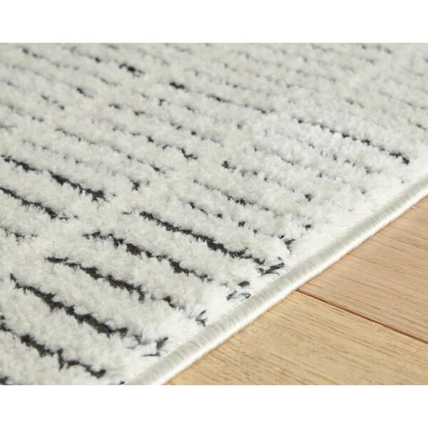 Turinwith 5 ft. x 7 ft. Beige/Black Striped Area Rug