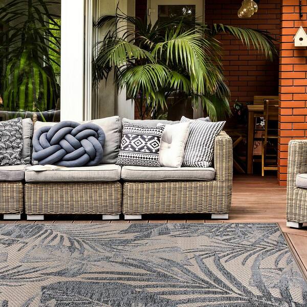 https://images.thdstatic.com/productImages/a11045b3-fc08-42c2-b7a9-982b92d2ee4a/svn/cream-world-rug-gallery-outdoor-rugs-432cream8x10-31_600.jpg