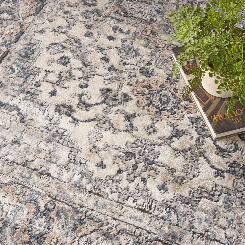 Ivory and Grey Synthetic 5' x 7' Reversible Area Rug