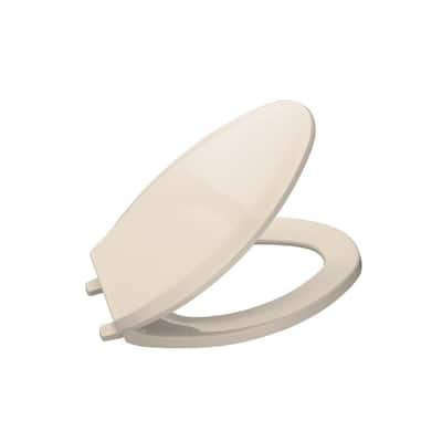 Lustra Elongated Closed-Front Toilet Seat in Innocent Blush