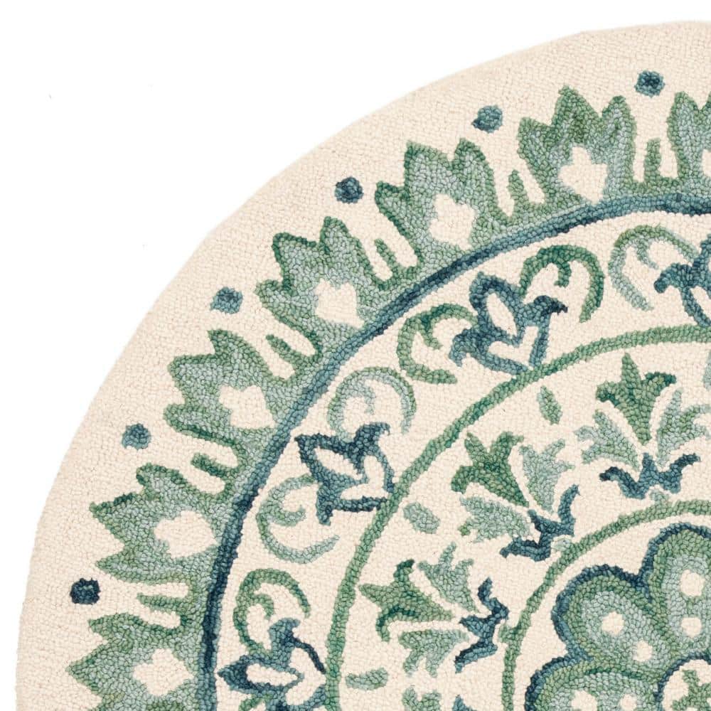 Ivory and Teal Floral Tufted Wool Round Rug