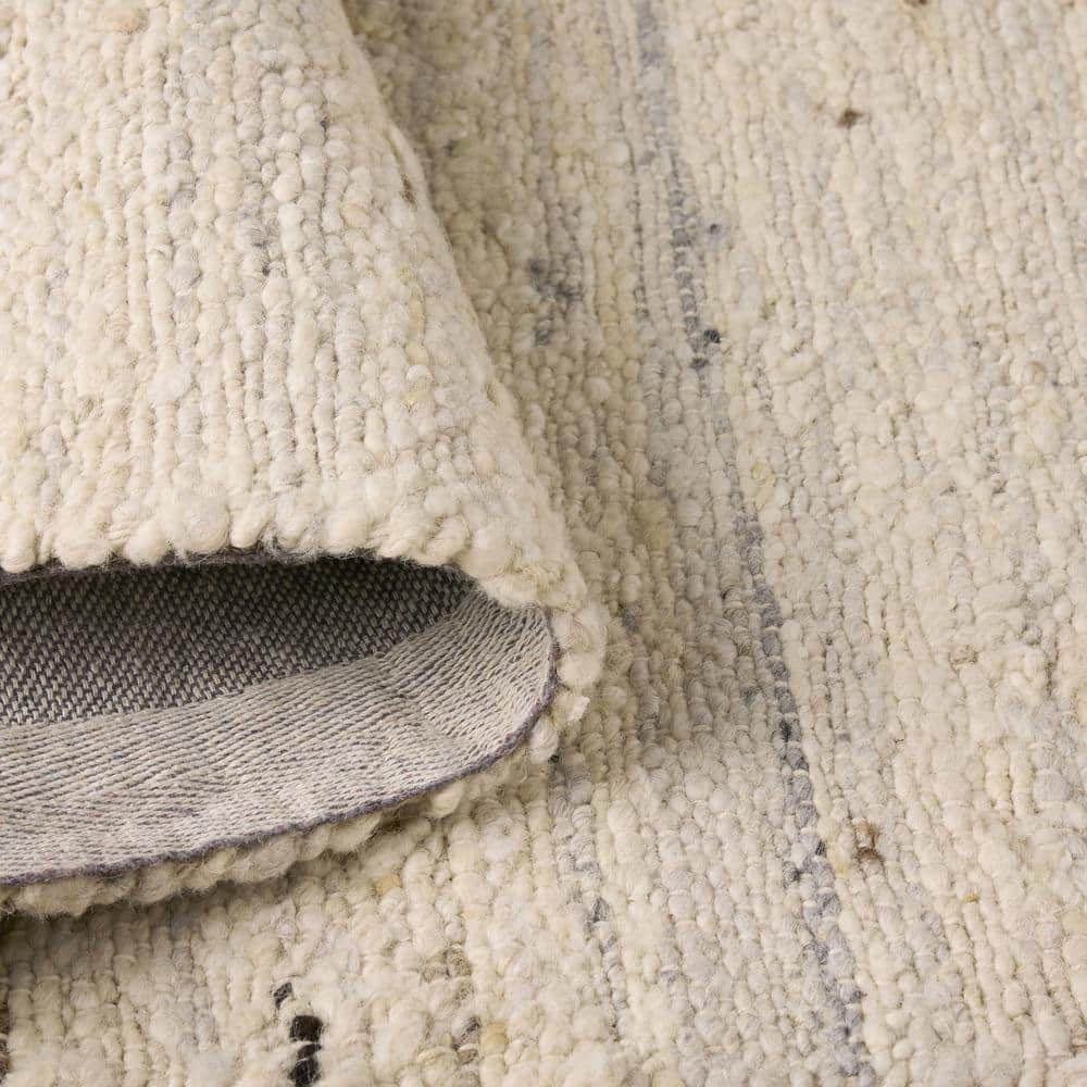 Ivory and Beige Handmade Wool 8' x 10' Area Rug