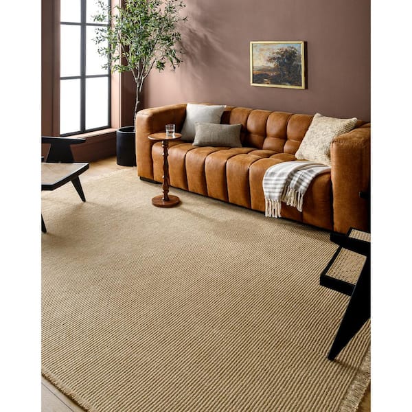 https://images.thdstatic.com/productImages/a12a03bb-53f0-4ec6-99f5-c56698626637/svn/solid-tan-surya-area-rugs-bokm2301-679-e1_600.jpg