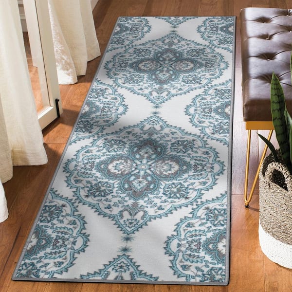 https://images.thdstatic.com/productImages/a13d6f4a-525a-4641-8304-80bc92d4b5e6/svn/2401-off-white-ottomanson-area-rugs-oth2401-2x7-c3_600.jpg