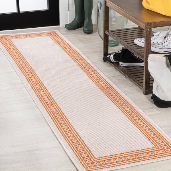 https://images.thdstatic.com/productImages/a14bc035-0992-4b4e-9e3e-cea9a6544f2b/svn/cream-orange-jonathan-y-outdoor-rugs-smb207f-28-64_600.jpg