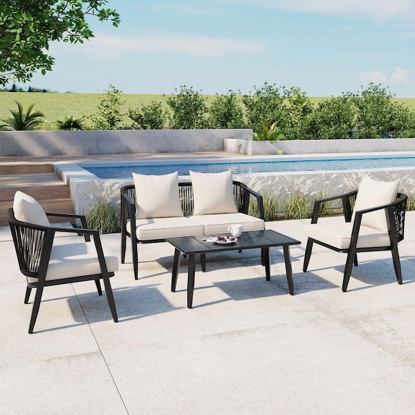 Harper & Bright Designs 4-Piece Black Metal Patio Conversation Set with Beige Cushions and Coffee Table