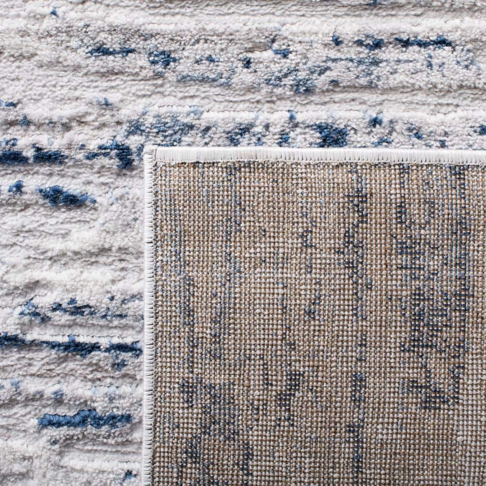 Amelia 8' Round Grey and Navy Abstract Synthetic Rug